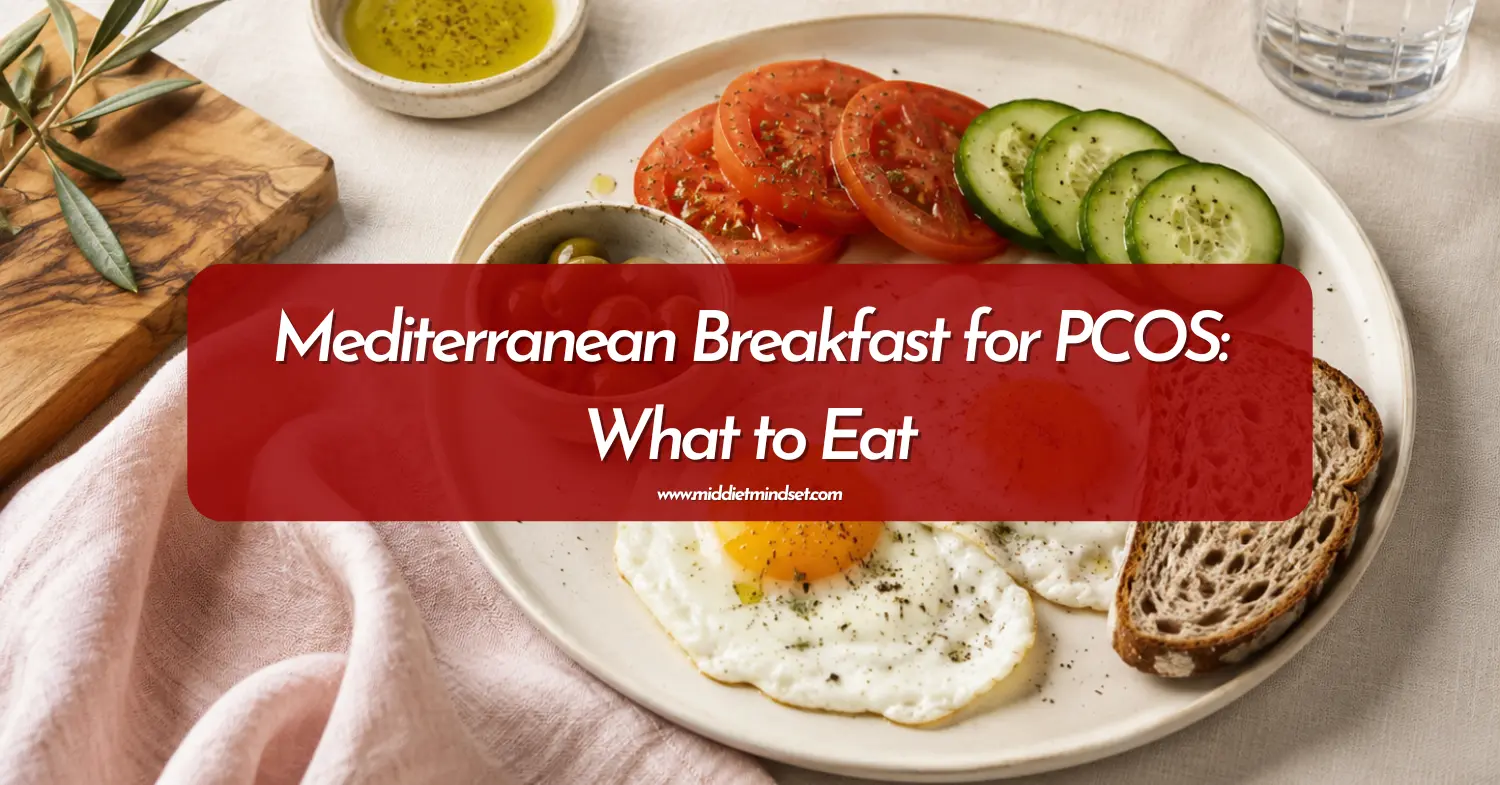 Mediterranean breakfast for PCOS with fried eggs, whole-grain bread, tomatoes, cucumber, and olives.
